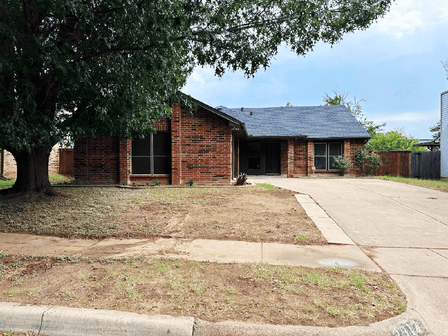 Exterior view of a property in Dallas, ideal for those looking to buy real estate with a spacious front yard