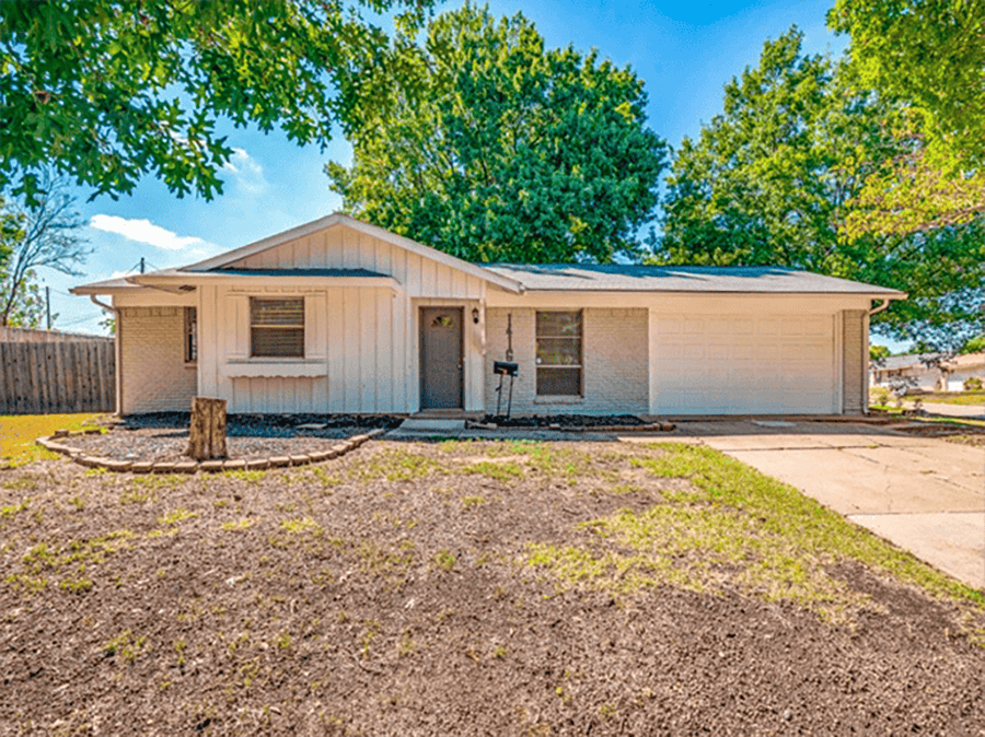 Simple property in Dallas with a spacious front yard, perfect for families looking to buy homes or sell properties.